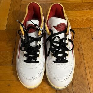 Jordan Men's White and Red Sneakers with Black Accents